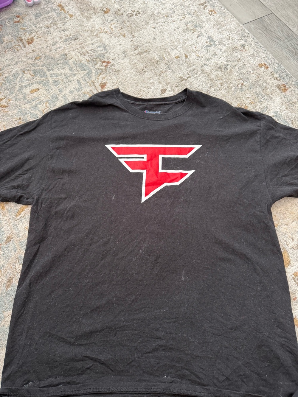 Champion Black Tee with Red Graphic Logo